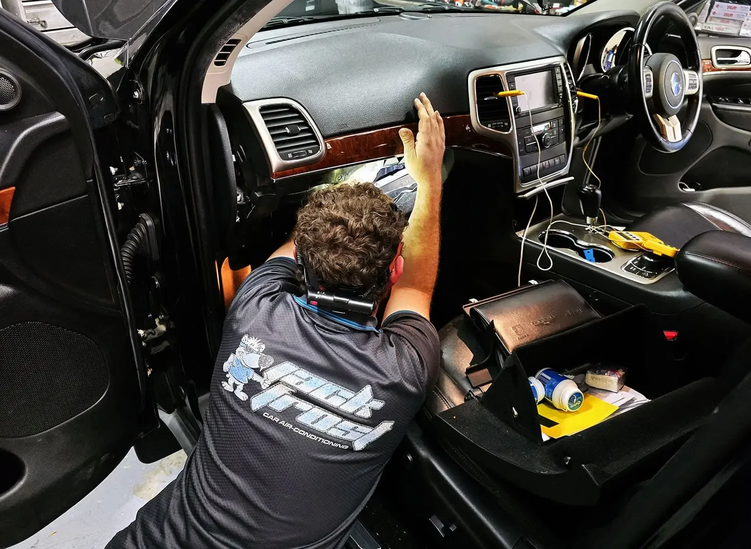 Jack Frost technician carrying out specialist car air conditioning repairs